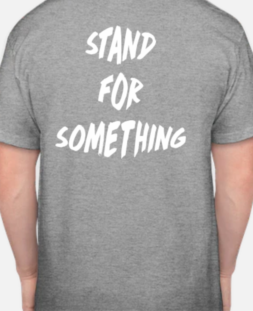 T-shirt with a text of stand for something